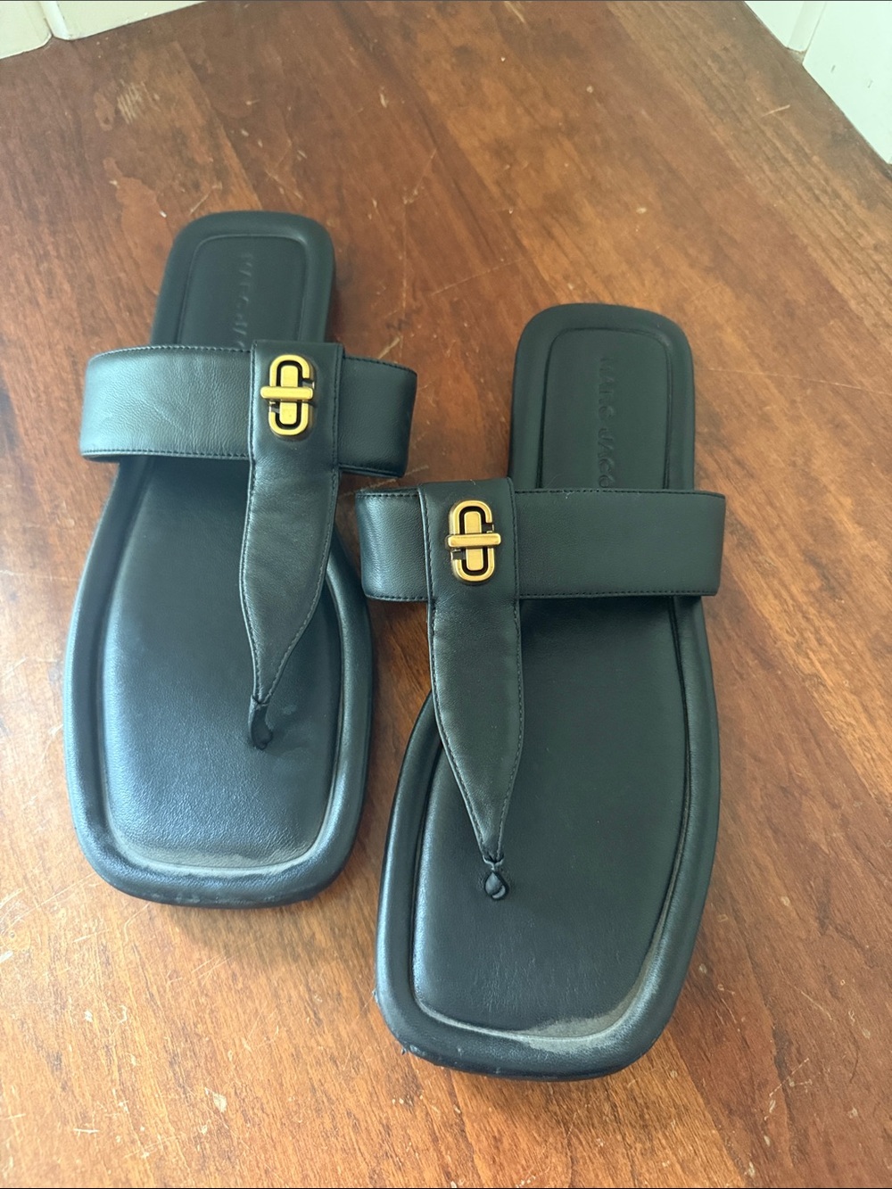 Marc Jacobs Black Leather Thong Sandals with Gold Hardware